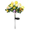 A solar-powered decorative light shaped like a yellow flower bush with green leaves, mounted on a stake with a solar panel. Náhled obrázku produktu