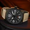 A close-up shot of a Citizen Eco-Drive watch with a black dial and a tan fabric strap. Produktbild-Vorschau