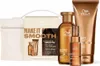 A Wella Professionals Ultimate Smooth gift set with shampoo, conditioner, and serum, presented in a white cosmetic bag. Produktbild-Vorschau