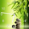 Wallario Design Wanduhr Steinstapel im Grünen aus Echtglas, Produktbild-Vorschau 1