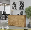 A modern dining room with a sideboard, dining table, chairs, and artwork. Produktbild-Vorschau