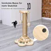 A cat scratching post with toys and balls, placed on a wooden floor in front of a cabinet. Produktbild-Vorschau