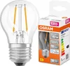 A clear LED light bulb and its packaging are shown side-by-side against a white background. Náhled obrázku produktu
