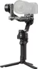 A black camera gimbal stabilizer with a camera mounted on it, shown on a white background. Náhled obrázku produktu