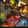 Collage of images showing a Minecraft-style torch lamp in various settings with children and adults. Náhled obrázku produktu