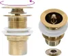 Two views of a golden pop-up drain assembly for a sink or bathtub. Produktbild-Vorschau