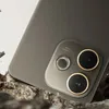 Close-up of a smartphone camera module with three lenses, set against a textured, rocky background. Produktbild-Vorschau