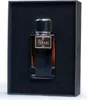 A bottle of perfume is presented in a black box. Anteprima dell’immagine prodotto