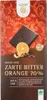 A chocolate bar wrapper with an image of a chocolate bar, an orange slice, and cocoa beans. Produktbild-Vorschau