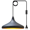 A black pendant lamp with a gold interior, suspended by a black cord with a plug and switch. Produktbild-Vorschau