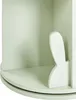 A close-up view of a light green rotating bookshelf with a white bunny ear detail on the side. Náhled obrázku produktu