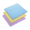 Three puzzle mats stacked on a white background. Voir les images du produit