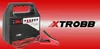 A battery charger and its logo are displayed against a red and white gradient background. Podgląd zdjęcia produktu