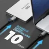 A deleyCON SSD is connected to a laptop via a USB-C cable, illustrating fast data transfer. Produktbild-Vorschau