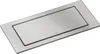 A close-up, angled view of a silver, rectangular pop-up power outlet with a brushed metal finish. Anteprima dell’immagine prodotto