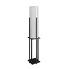 A floor lamp with a white cylindrical shade and a black metal frame, presented on a white background. Produktbild-Vorschau