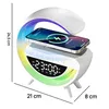 A bedside lamp with a phone charging on top, displaying dimensions. Podgląd zdjęcia produktu