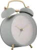 A close-up studio shot of a blue analog alarm clock with gold accents. Anteprima dell’immagine prodotto