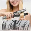A woman is using a hair straightener on her blonde hair. Below is a graphic showing hair strands and water droplets. Produktbild-Vorschau