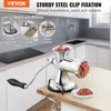 A manual meat grinder is shown on a kitchen counter, with text overlays highlighting its features and fixing methods. Podgląd zdjęcia produktu