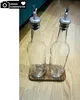 set di 2 bottiglie in vetro per olio con supporto in legno Anteprima dell’immagine prodotto 7