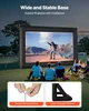 People are watching a movie on a large inflatable screen outdoors at dusk. Anteprima dell’immagine prodotto