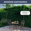 A garden scene with a table and chairs set up under a green pergola, suggesting outdoor relaxation and dining. Produktbild-Vorschau