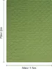A green quilted blanket is shown flat against a white background with dimensions indicated. Anteprima dell’immagine prodotto