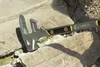 A close-up view of a Stanley FUBAR demolition tool resting on broken concrete. Podgląd zdjęcia produktu