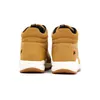 Rear view of two brown Fila boots against a white background. Produktbild-Vorschau