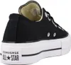 A side view of a black Converse Chuck Taylor All Star Lift Ox sneaker with a white platform sole. Voir les images du produit