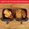 Two air fryer baskets are shown side-by-side on a wooden surface. The left basket contains a whole roasted chicken, and the right basket is divided to hold french fries and a grilled steak. Voir les images du produit