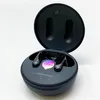 LG TONE Free DFP9 black in-ear headphones in their open charging case. Produktbild-Vorschau