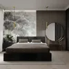 A modern bedroom with a large bed, a dresser, and a decorative mirror. Produktbild-Vorschau