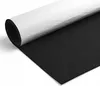 A roll of black felt with a white backing is partially unrolled on a white surface. Anteprima dell’immagine prodotto