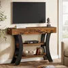 A console table with a TV and decorative items in a living room setting. Anteprima dell’immagine prodotto