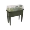 A raised garden bed with a clear lid, containing plants. Náhled obrázku produktu