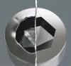 A close-up, torn image showing the inside of a hexagonal socket on the right and a damaged, warped socket on the left. Anteprima dell’immagine prodotto