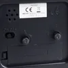 The back of a black alarm clock with various controls and labels. Produktbild-Vorschau
