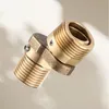A brass plumbing fitting with threaded ends, angled to show its swivel mechanism. Anteprima dell’immagine prodotto