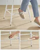 A collage showing a person sitting on a white stool, with close-ups of assembly and cleaning. Náhled obrázku produktu
