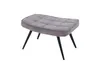A gray upholstered ottoman with black metal legs is shown against a white background. Náhled obrázku produktu