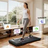 A woman is walking on a treadmill indoors, with overlaid graphics showing exercise metrics. Produktbild-Vorschau