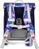 The back of a purple backpack with a tropical leaf pattern. Produktbild-Vorschau