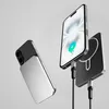 Two iPhones are shown, one with a power bank attached and another connected to a charging pad, against a plain background. Produktbild-Vorschau
