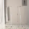 A white floor mirror with a stand is shown from two angles, with dimensions indicated by measurement lines and text. Náhled obrázku produktu