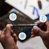 Hands holding a screwdriver with icons indicating its features. Náhľad obrázku produktu