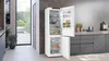 Siemens iQ300 KG36NVWCG, Freistehende Kühl-Gefrier-Kombination mit Gefrierbereich unten, 186 x 60 cm, Weiß, Total noFrost, aufgestellt im Raum, geöffnet Produktbild-Vorschau