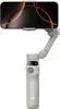 A smartphone gimbal stabilizer is shown against a white background. Voir les images du produit