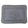 A gray pet mat with a paw print design. Náhled obrázku produktu